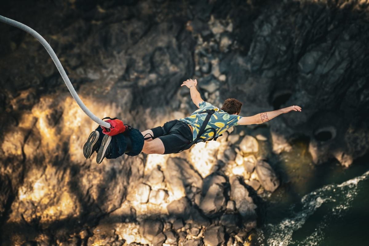 Bungee jumper falling from the Victoria Falls Bridge
