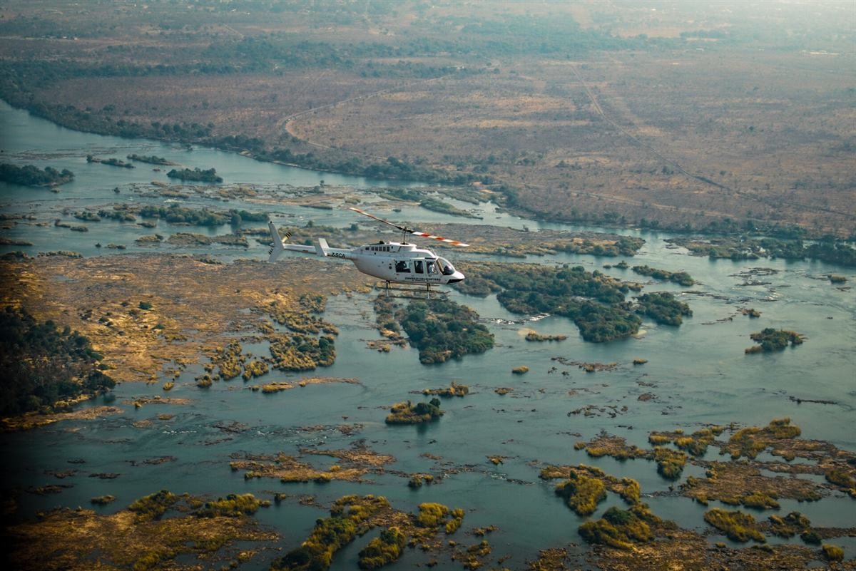 Helicopter on the pad before a 25 minute extended gorge flight at Victoria Falls