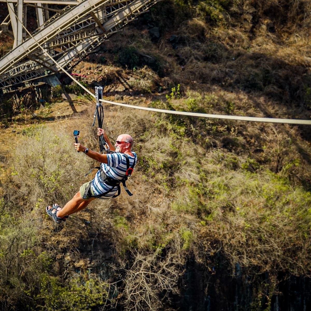Zip line rider crossing the Batoka Gorge at Victoria Falls