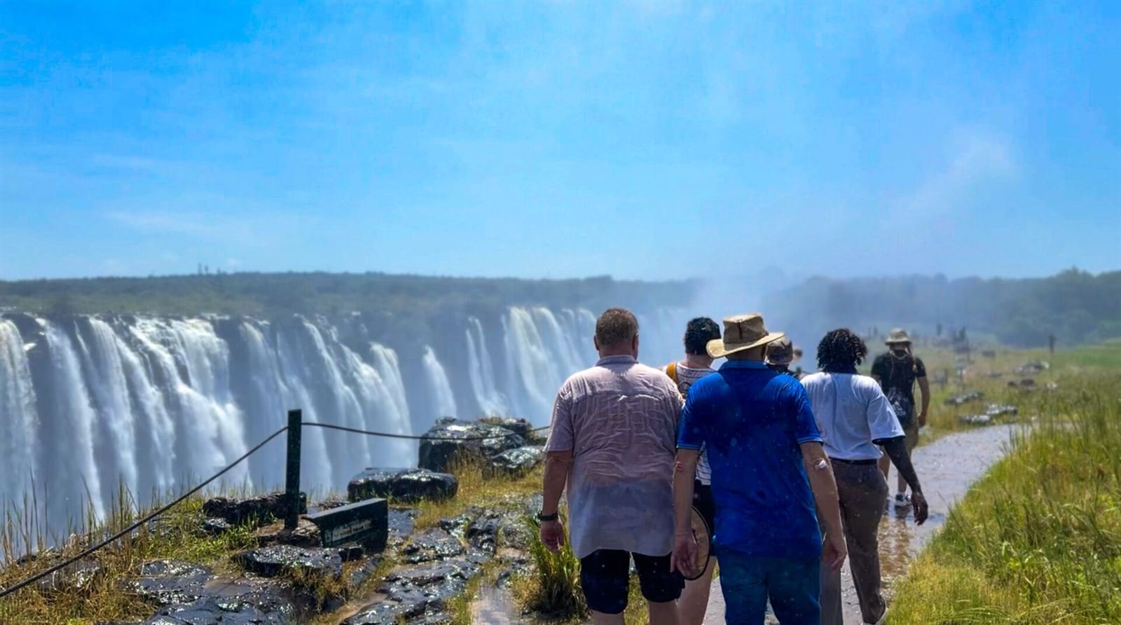 Victoria Falls seen from the air showing the full width of the curtain and the gorge below