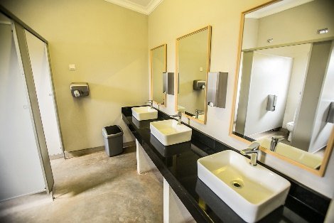 Modern communal bathroom for campers at Explorers Village