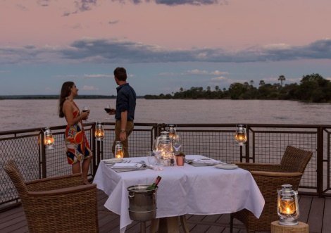 Riverside dinner on the deck at Old Drift Lodge