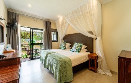 Guest room at Victoria Falls Oasis