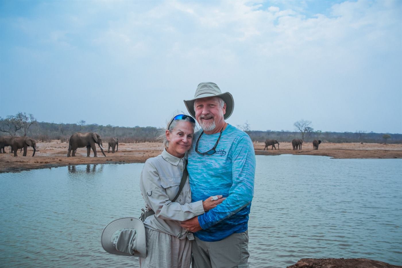 Elephants at a waterhole during the September to November dry season near Victoria Falls