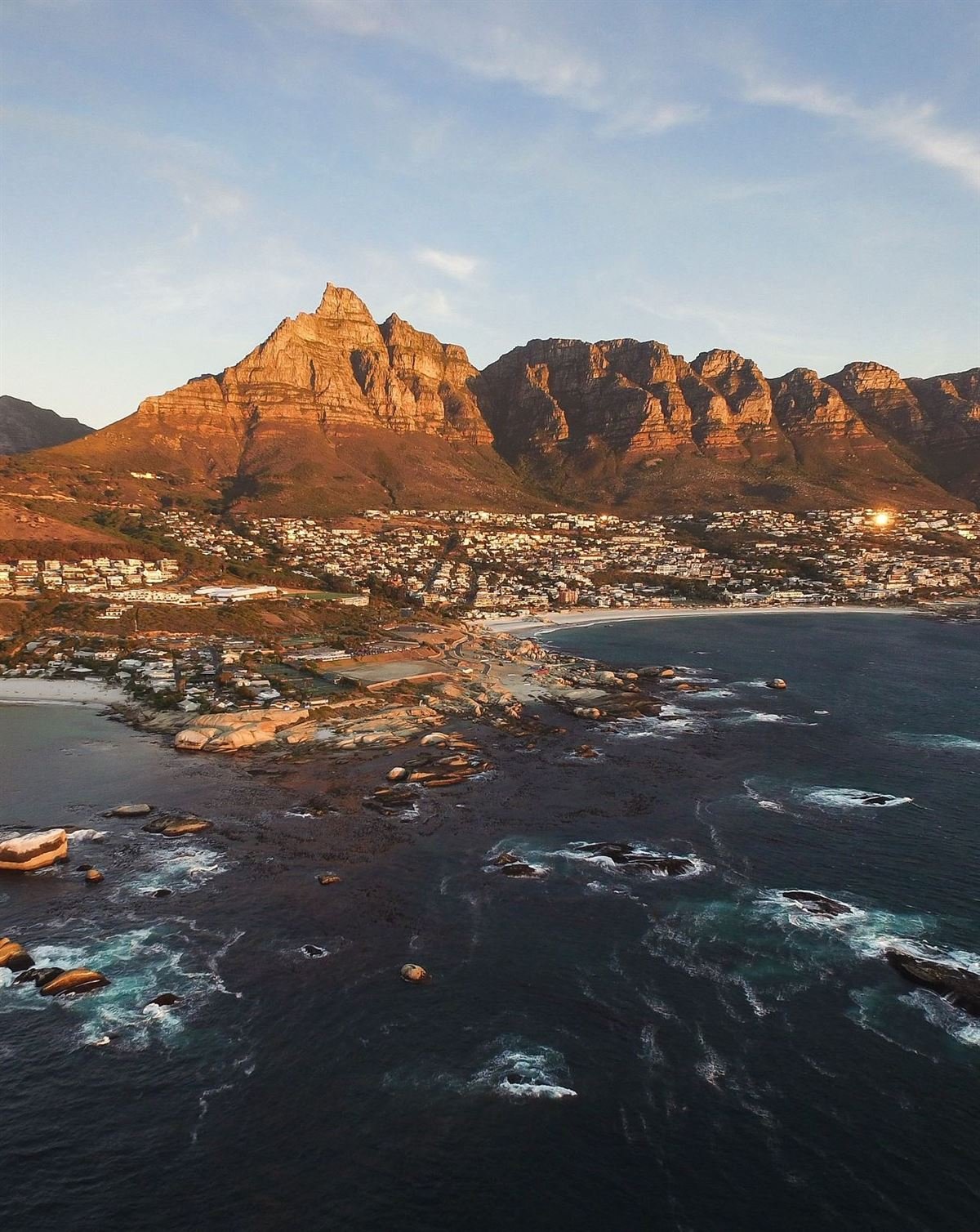 Camps Bay and the Twelve Apostles mountains at sunset, Cape Town