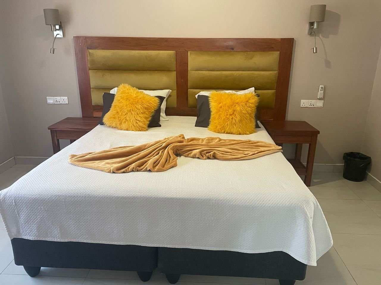 Deluxe room with a king bed at Bishop House, Victoria Falls