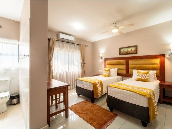 Twin bedroom in a Bishop House suite
