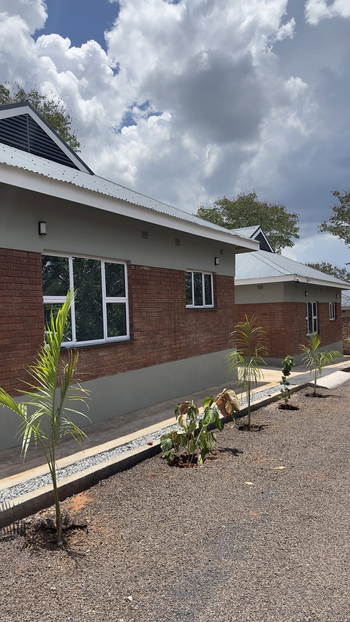 Exterior of the Bonga Villa apartments in their gated yard