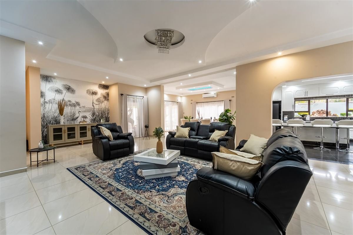 Open-plan lounge with recliners at Elena House, a self-catering villa