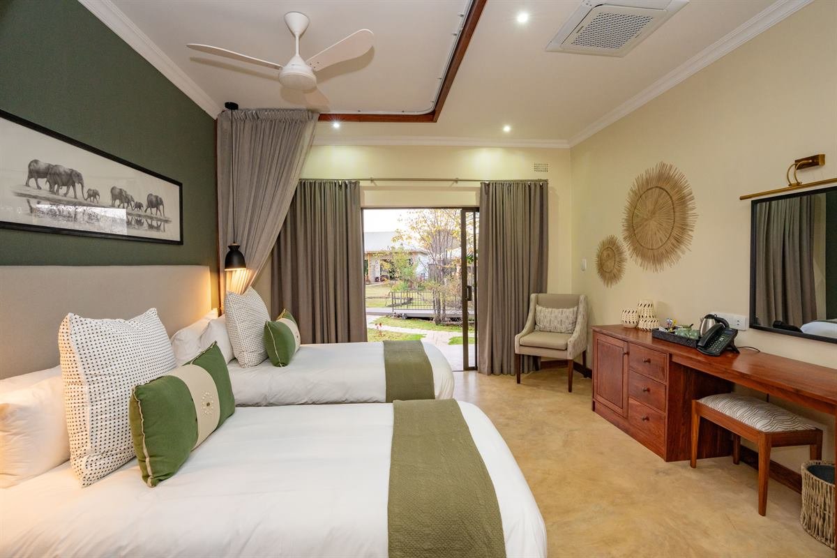Room interior at Insika Lodge, mid-range Victoria Falls accommodation