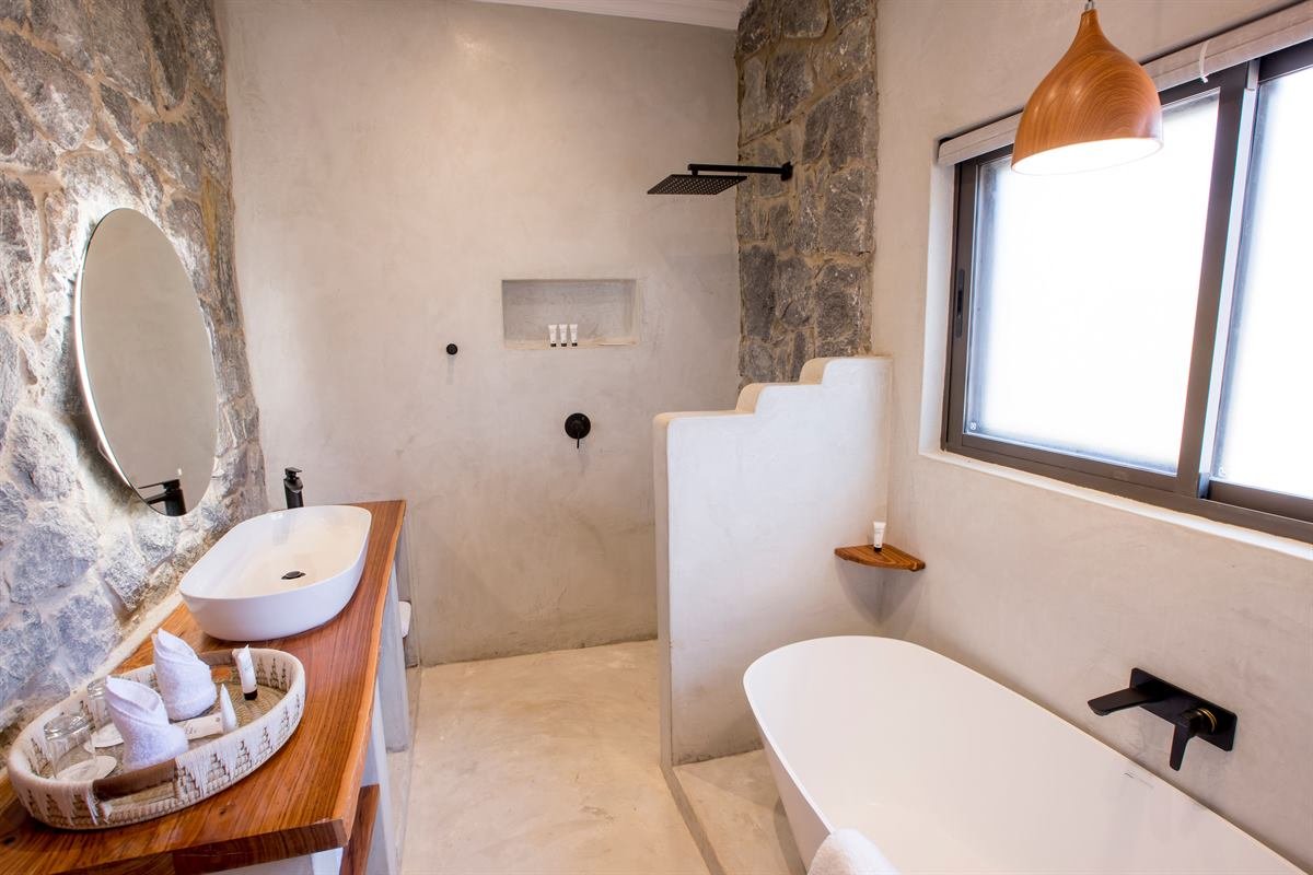 Freestanding bath in a luxury Victoria Falls villa bathroom