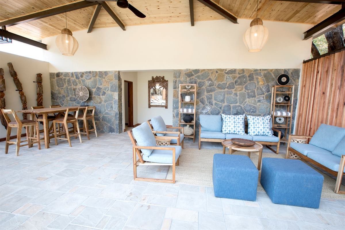 Open-plan lounge in a self-catering villa in Victoria Falls
