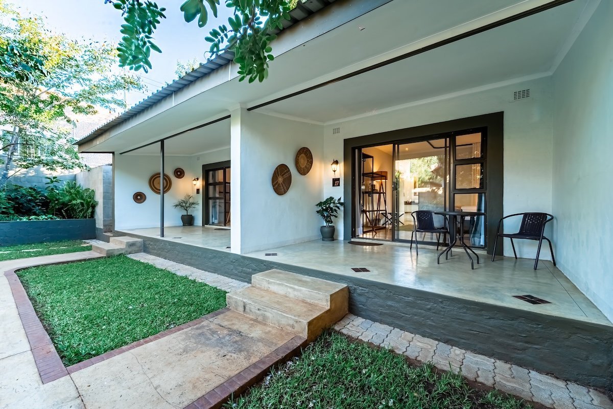 Garden veranda outside the rooms at Kabakwe Guest Lodge