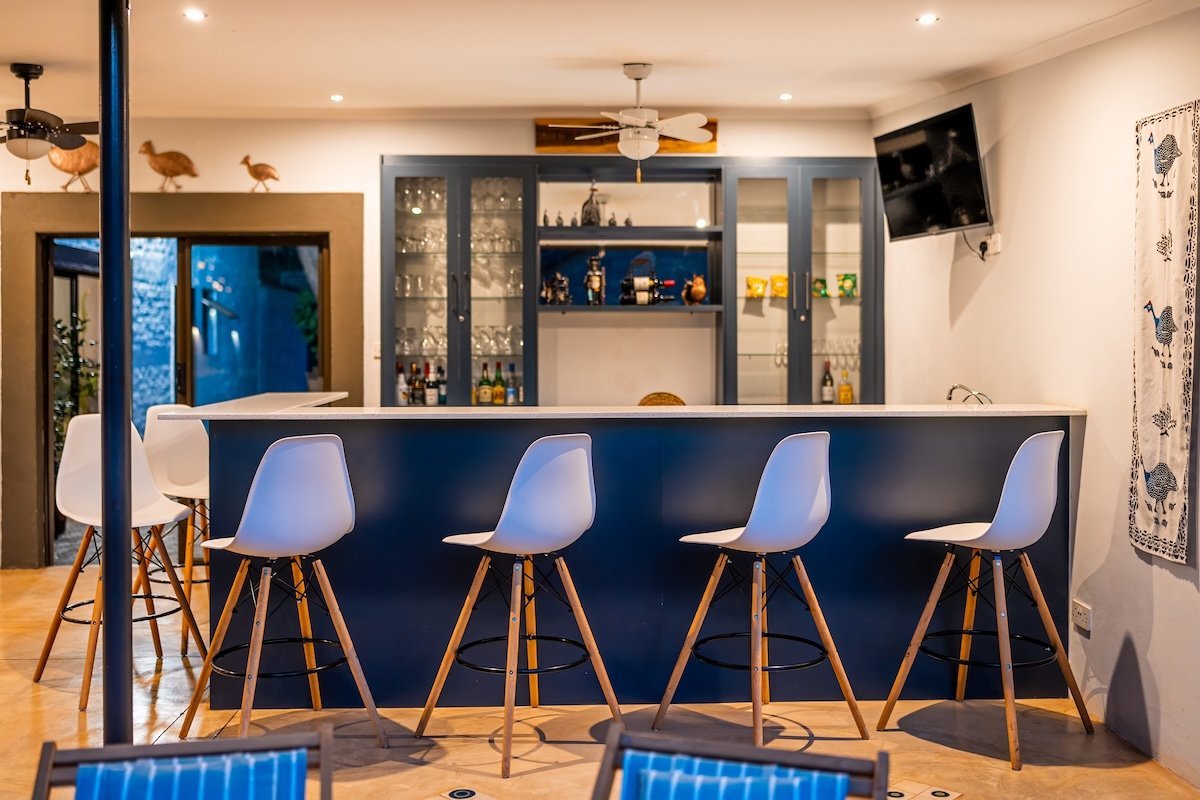 Bar with high stools at Kabakwe Guest Lodge, Victoria Falls