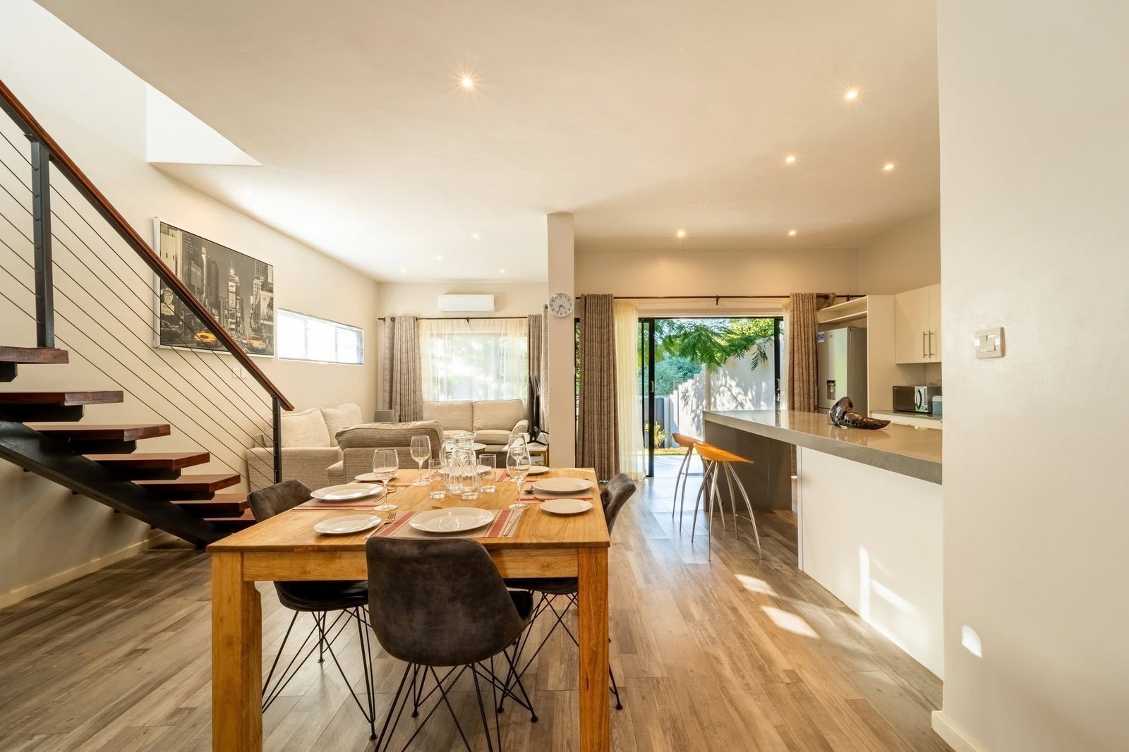 Open-plan dining and kitchen at 53 Reynard Apartments, Victoria Falls