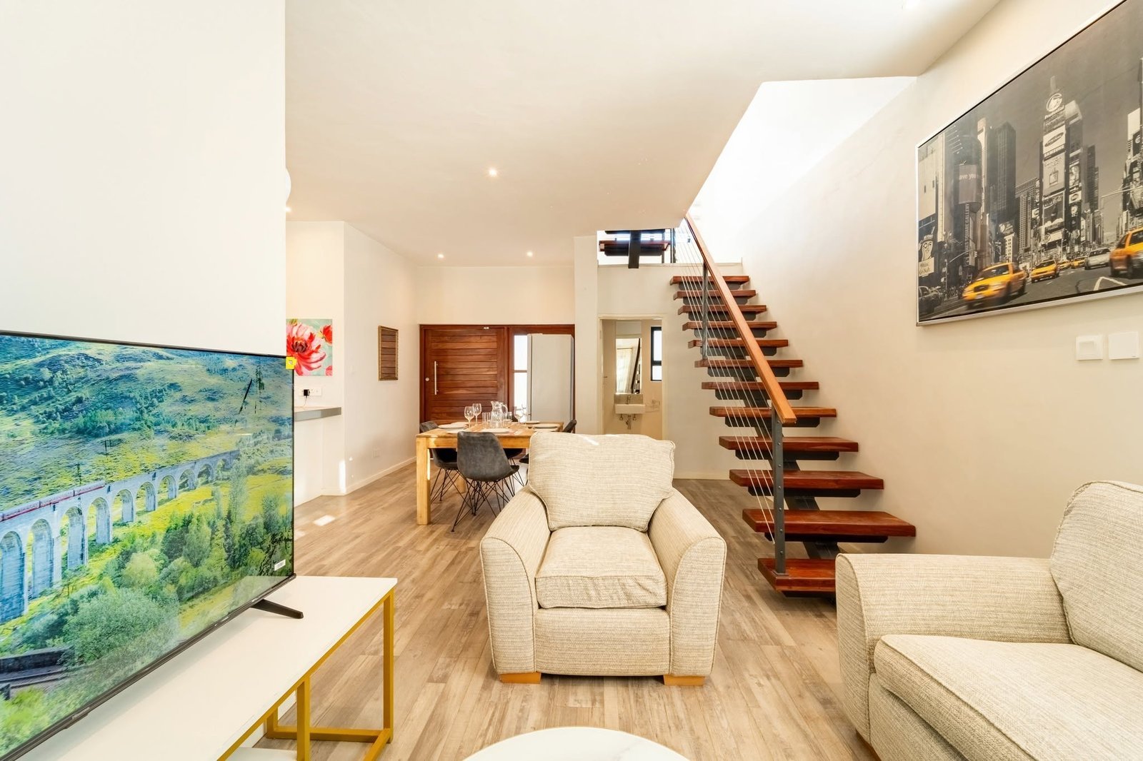 Lounge and staircase in a 53 Reynard apartment