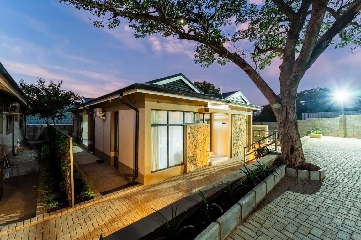 Apartments lit at dusk at Sea of Dreams, Victoria Falls