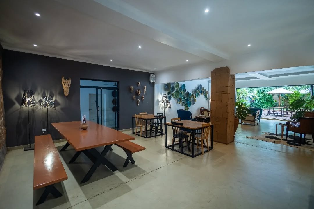 Indoor communal lounge and dining area at Tabokana House