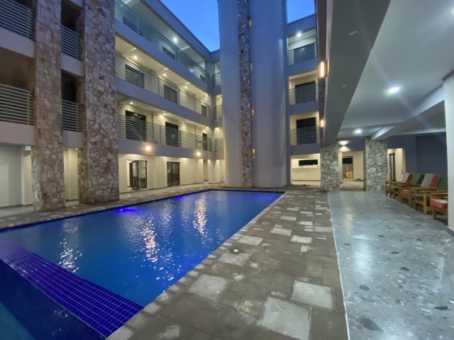 Swimming pool beside the guest wing at The Outlook Lodge, Victoria Falls