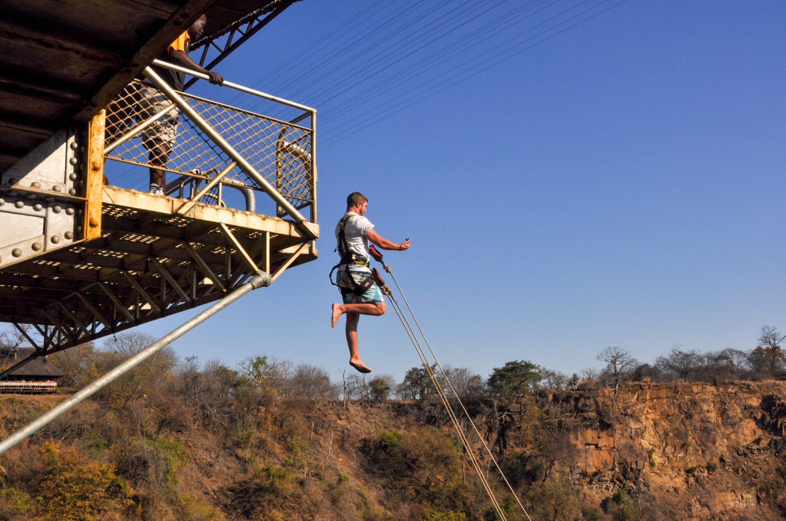 A jumper on the Victoria Falls Bridge walkway before the swing