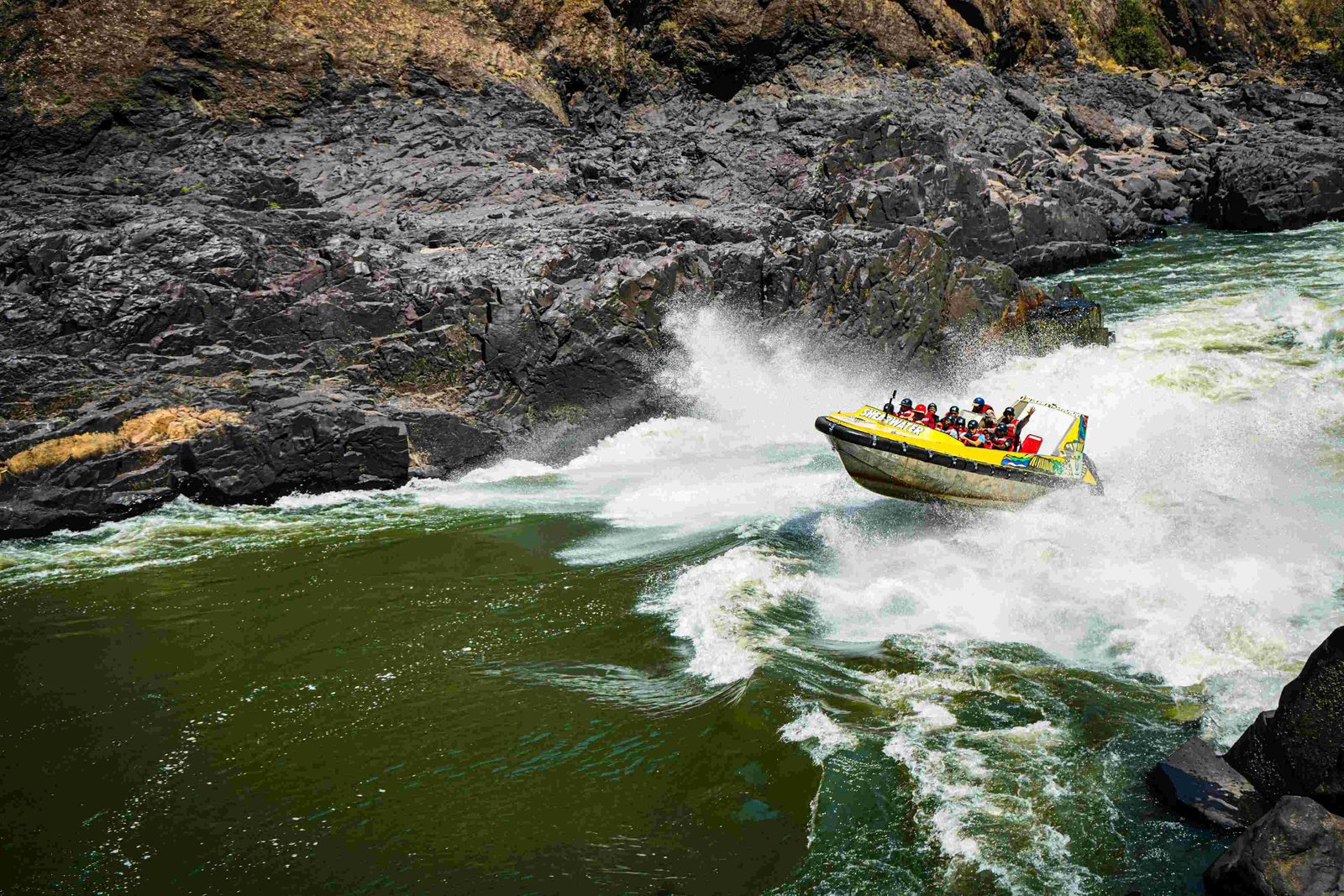 Jet boat spinning through a rapid in the Batoka Gorge