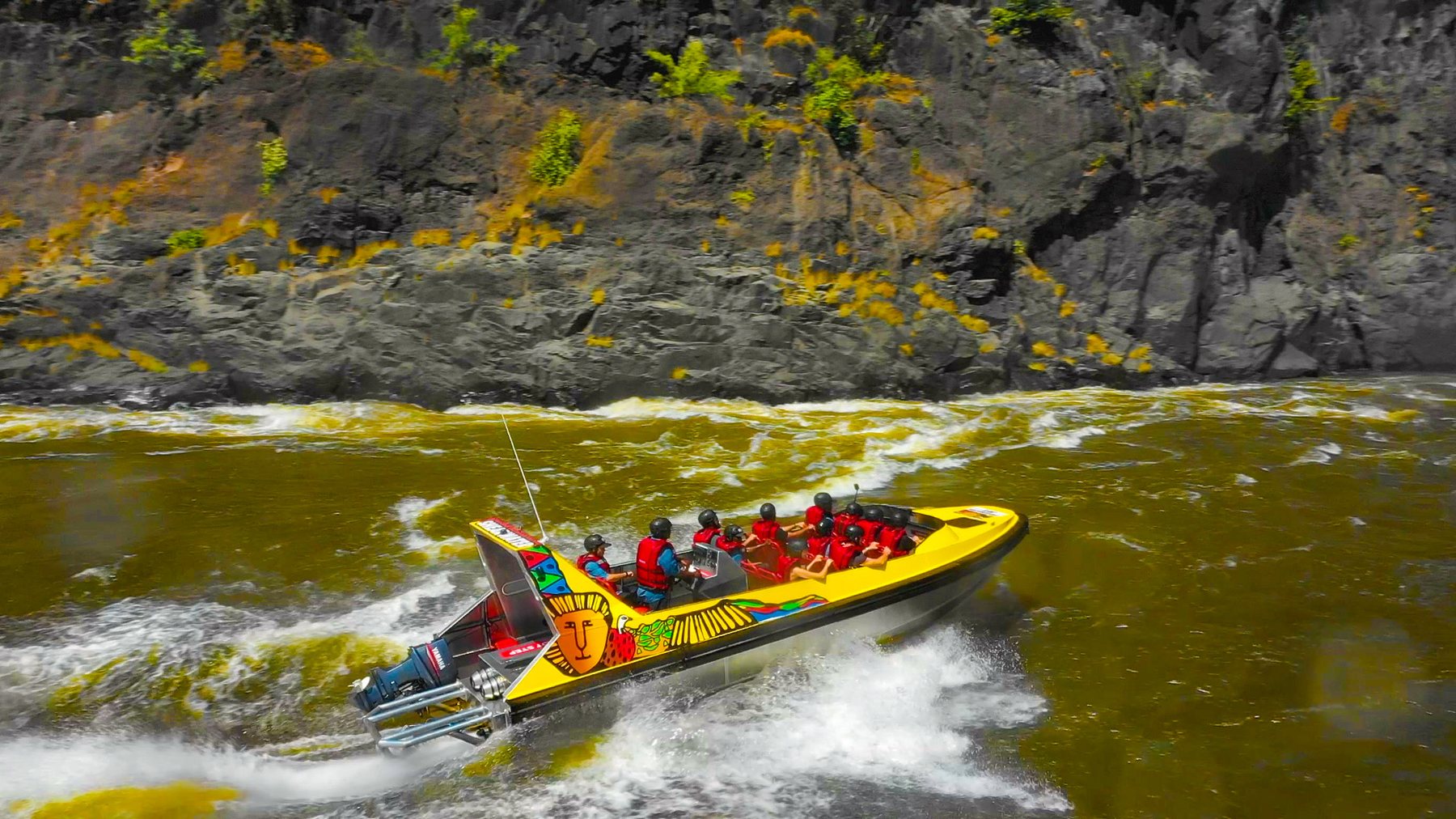 Jetboat racing through the rapids of the Batoka Gorge below Victoria Falls