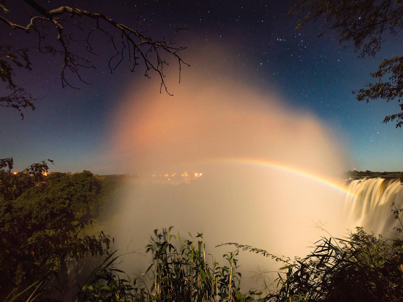 Moonbow colours in the spray above the Victoria Falls gorge
